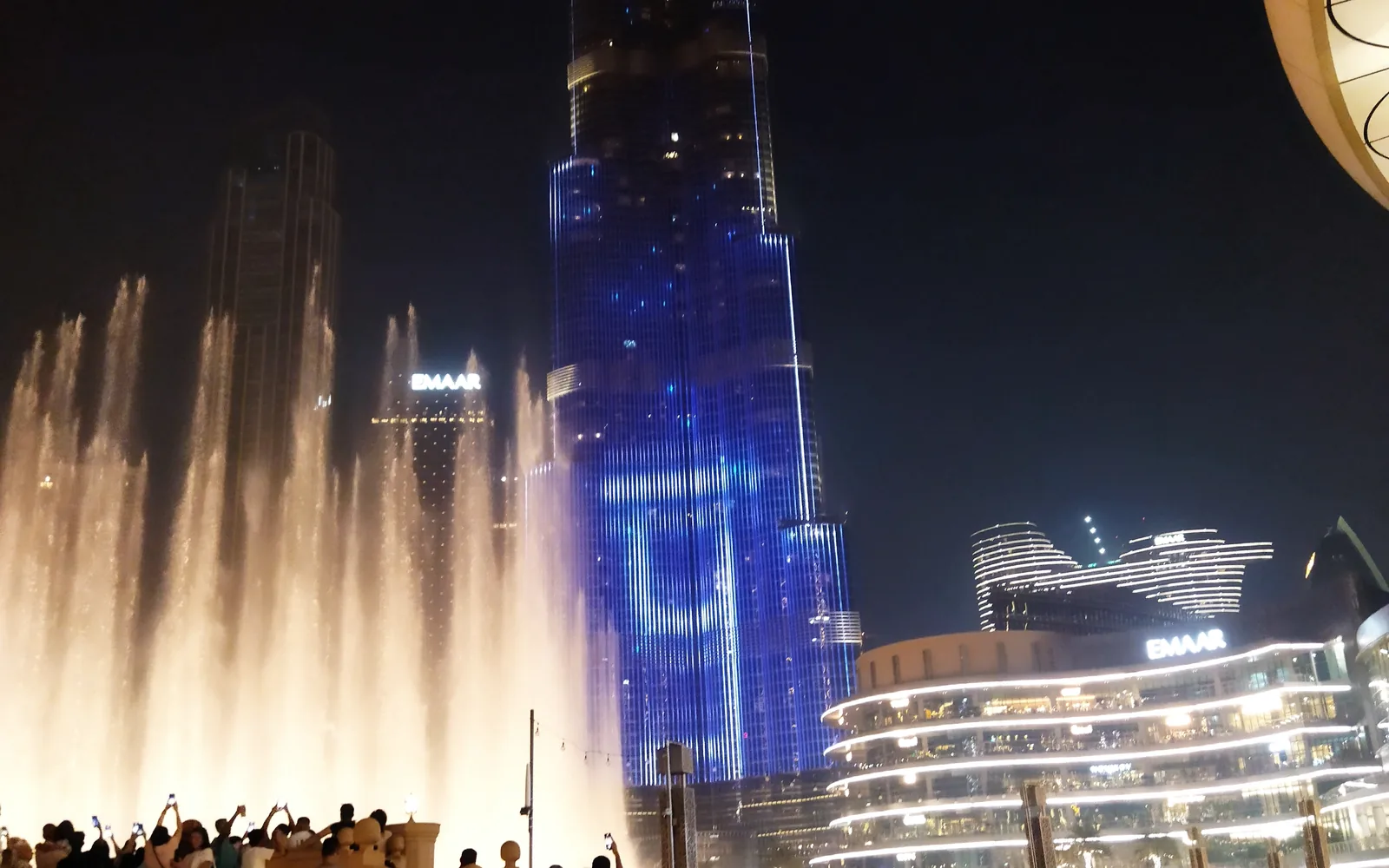 The Burj Khalifa lit at night above the fountain, Dubai, UAE — photo by goFLY founder Mahabub Alam Razu