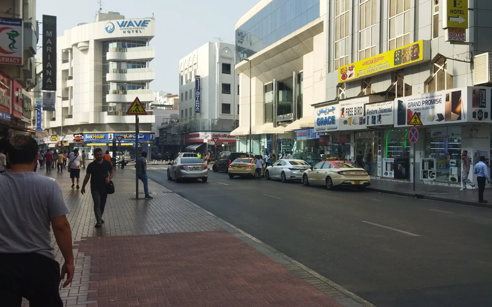 A busy shopping street in old Dubai's Deira district, UAE — photo by goFLY founder Mahabub Alam Razu, August 2023