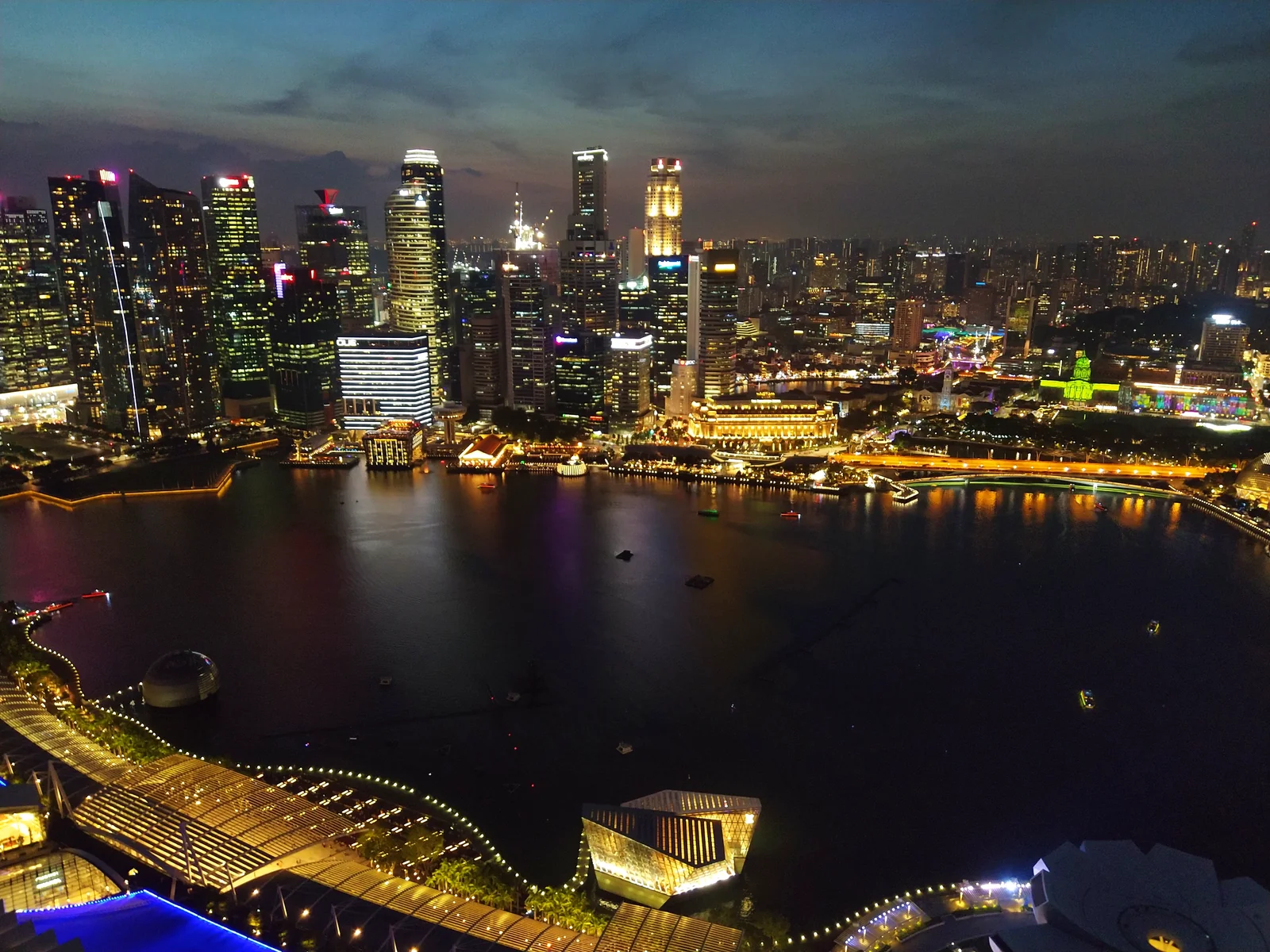 Marina Bay Sands and the Singapore skyline illuminated at night — photographed by the goFLY team in Singapore