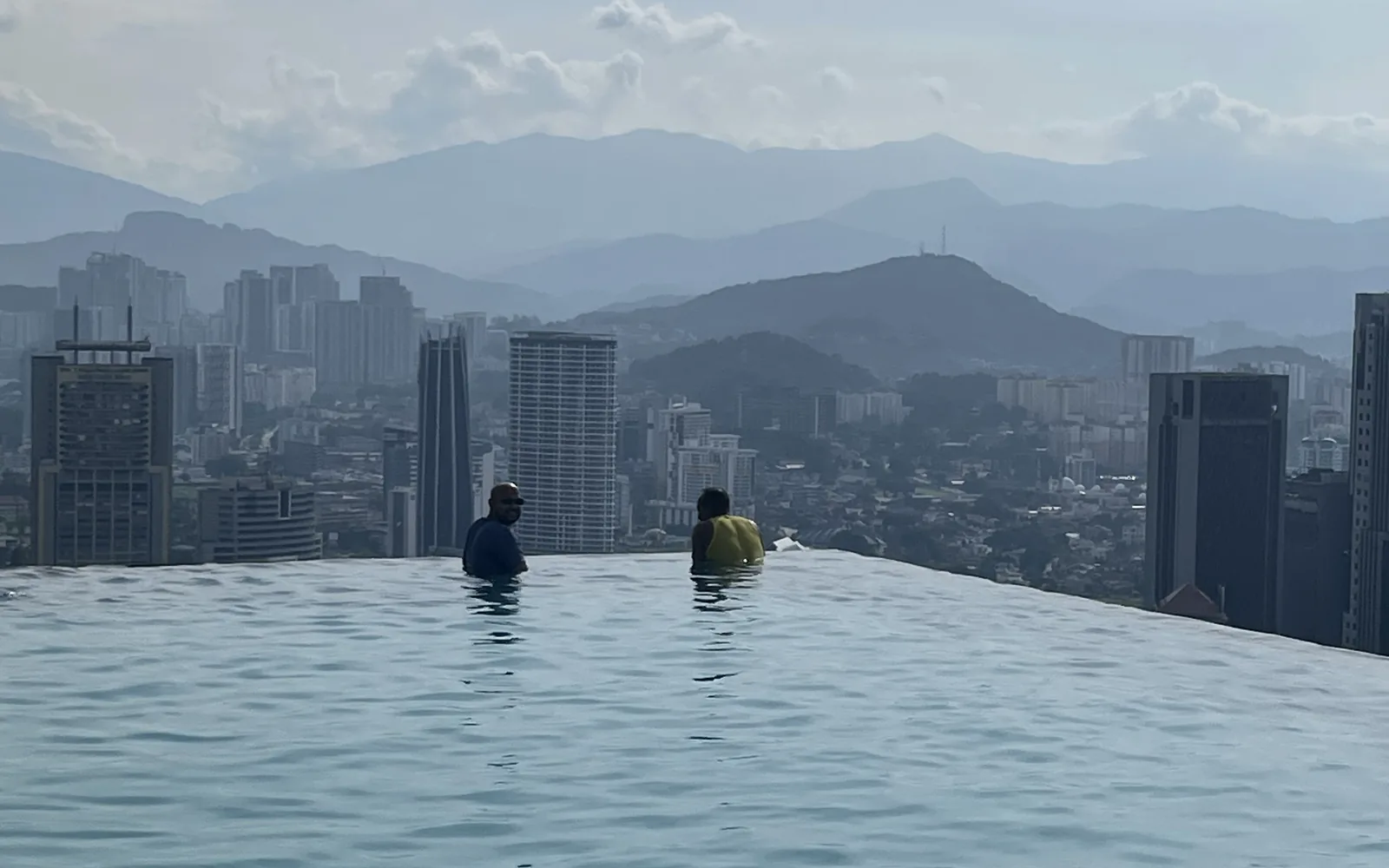 The Kuala Lumpur skyline from a rooftop infinity pool, Malaysia — photo by goFLY founder Mahabub Alam Razu, August 2024