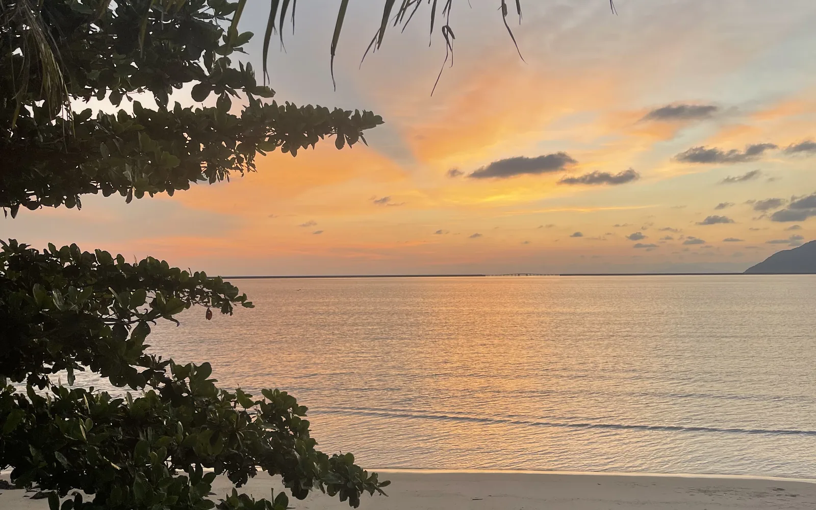 Golden sunset over the sea at Pantai Cenang, Langkawi, Malaysia — photo by goFLY founder Mahabub Alam Razu, August 2024