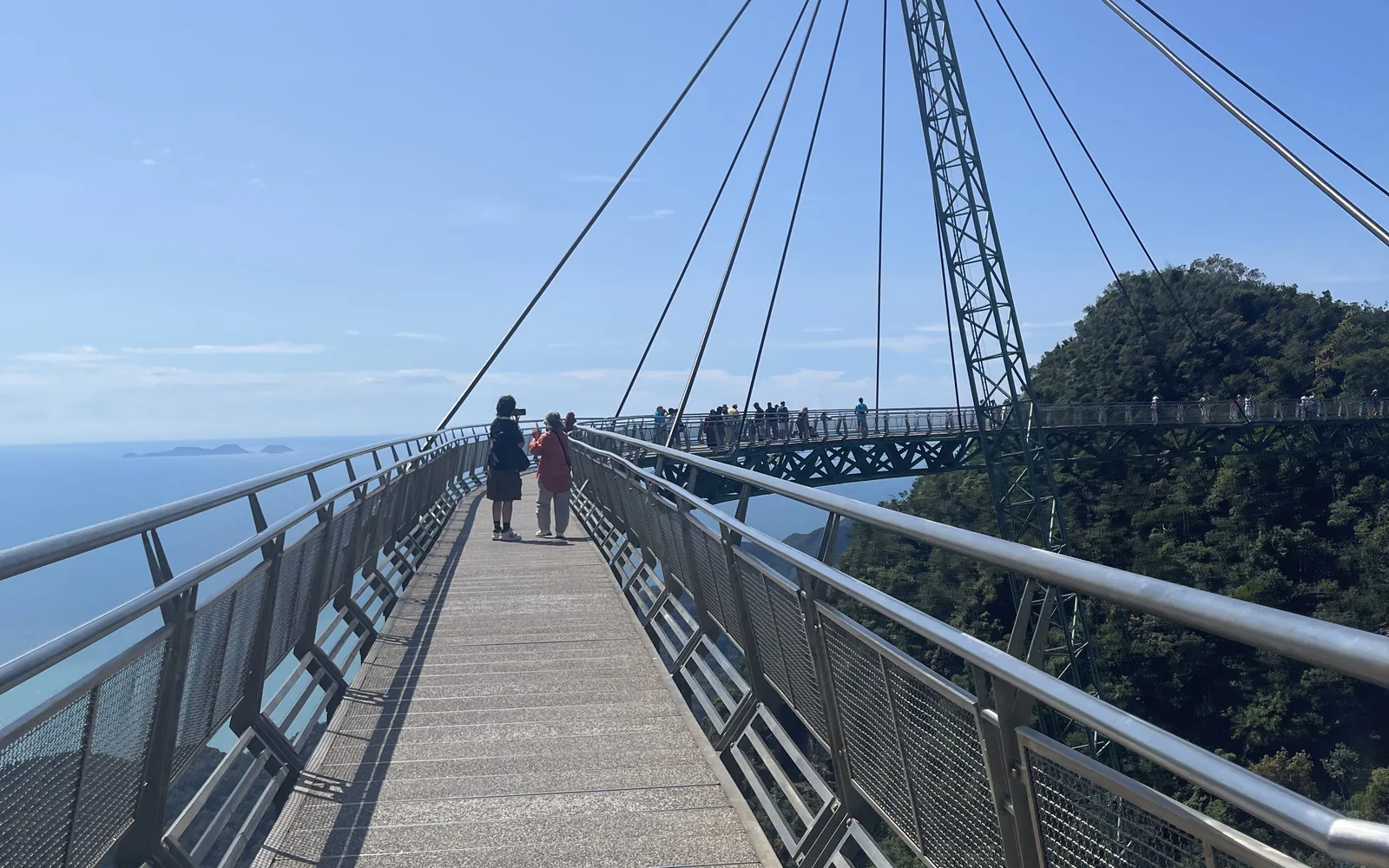 Walking across the Langkawi Sky Bridge high above the forest, Malaysia — photo by goFLY founder Mahabub Alam Razu, August 2024