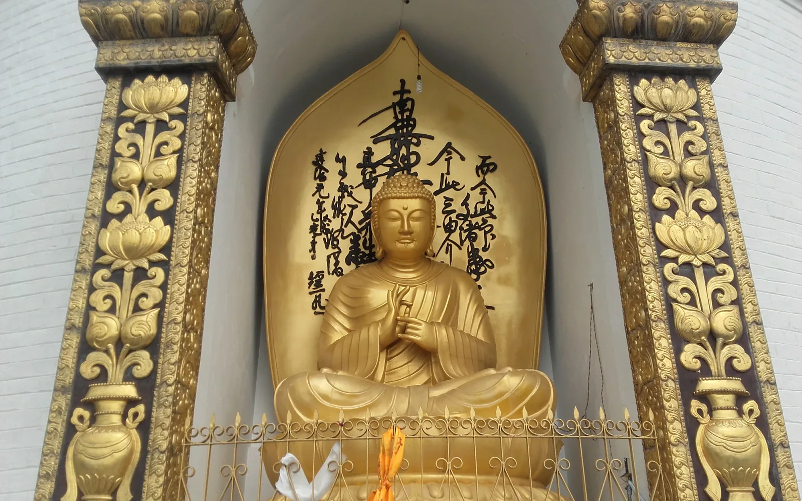 A gilded seated Buddha statue enshrined at the World Peace Pagoda, Pokhara — photo by goFLY founder Mahabub Alam Razu, May 2017