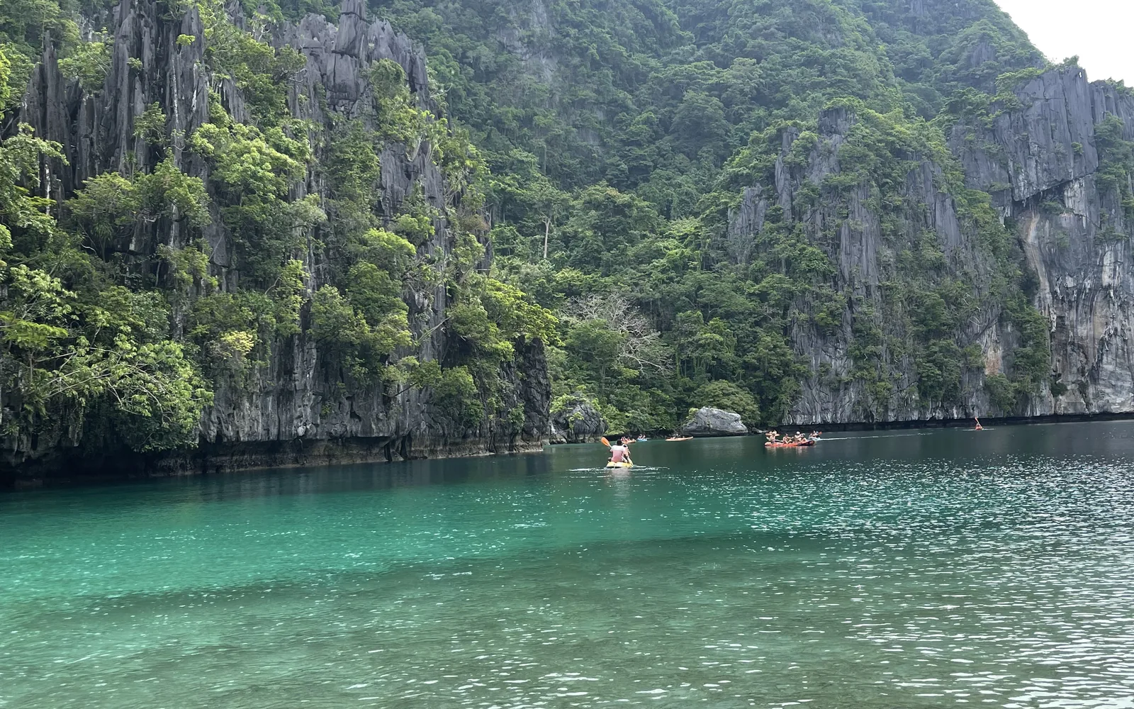 Panorama of the Big Lagoon's emerald water and limestone peaks, El Nido, Palawan, Philippines — photo by goFLY founder Mahabub Alam Razu, August 2024