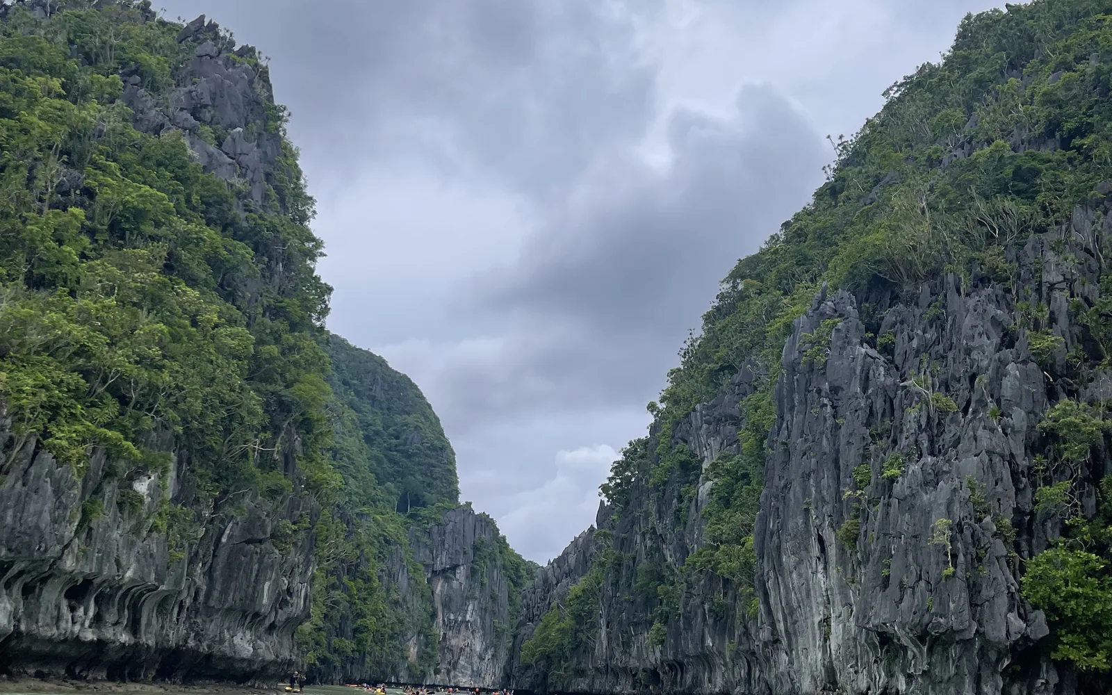 A narrow channel between limestone cliffs leading into an El Nido lagoon, Palawan, Philippines — photo by goFLY founder Mahabub Alam Razu, August 2024