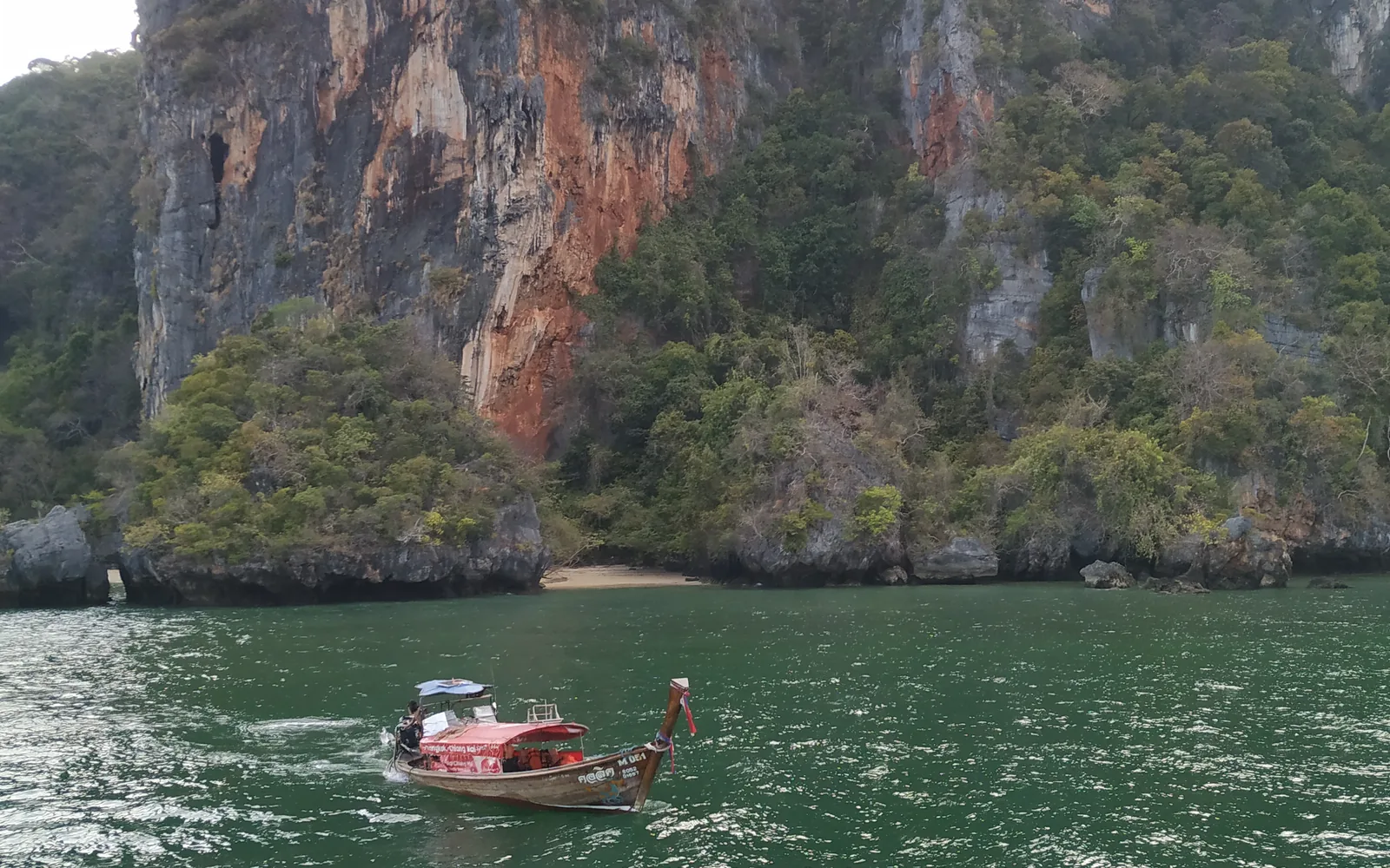 Sheer limestone karst cliffs rising from the Andaman Sea near Krabi, Thailand — photo by goFLY founder Mahabub Alam Razu, March 2019
