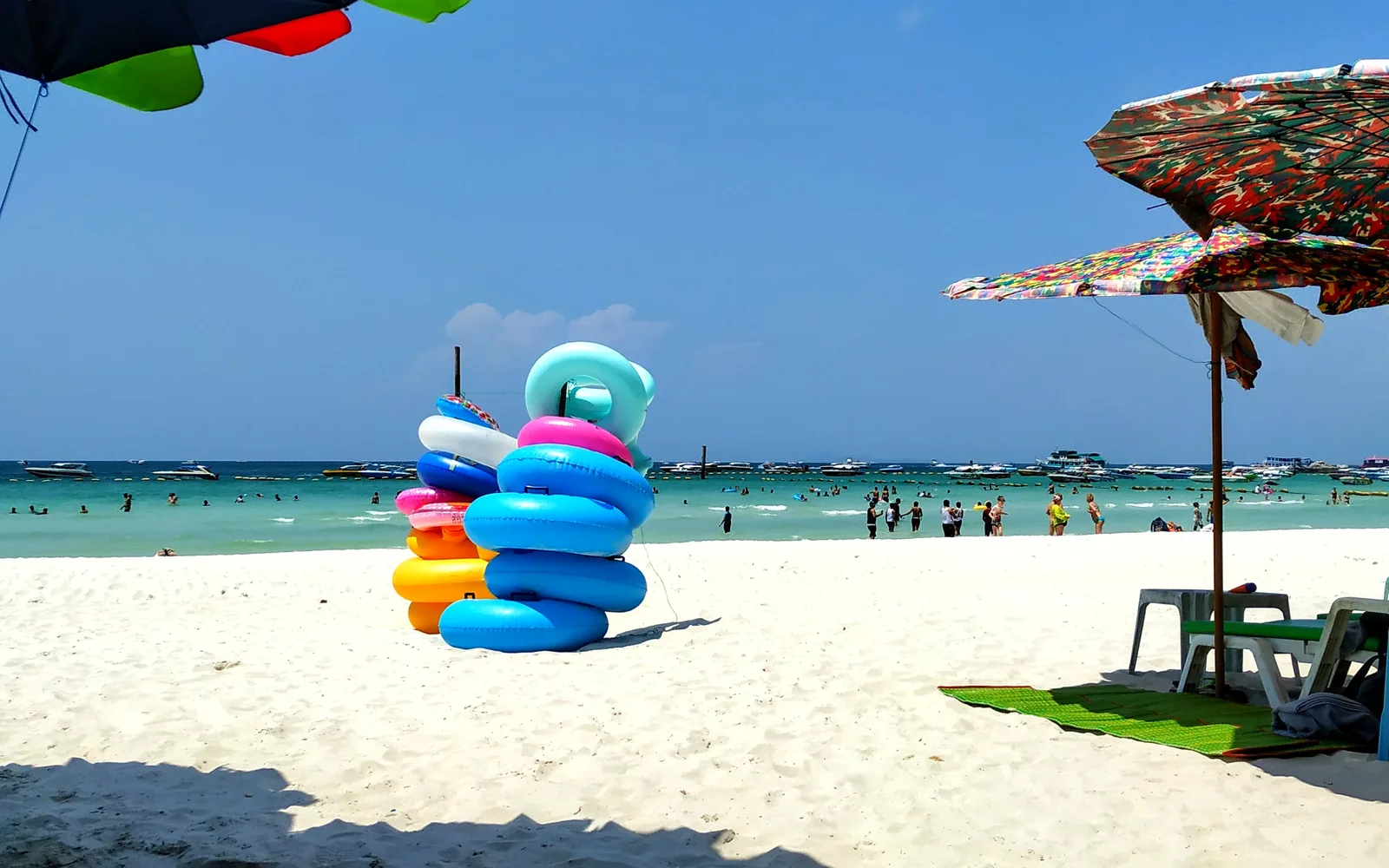 Pattaya Beach with umbrellas on the sand, Thailand — photo by goFLY founder Mahabub Alam Razu