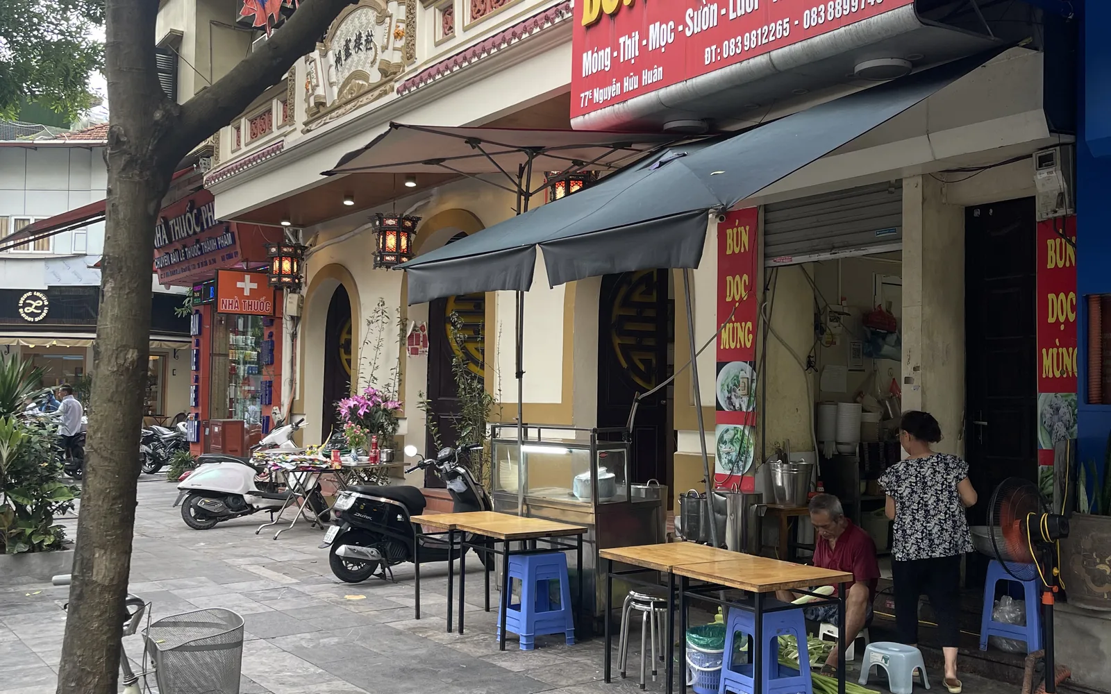 A street of shops and eateries in Hanoi's old quarter, Vietnam — photo by goFLY founder Mahabub Alam Razu, August 2024