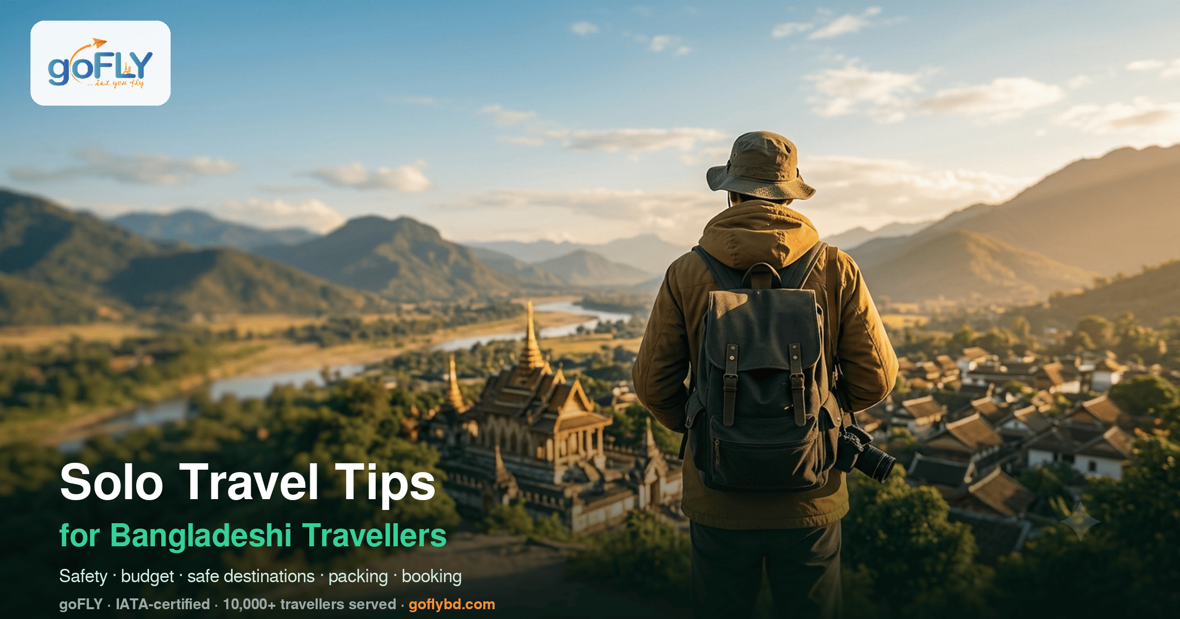 Solo travel tips for Bangladeshi travellers — a backpacker overlooking a temple and mountain valley at golden hour, goFLY 2026 guide